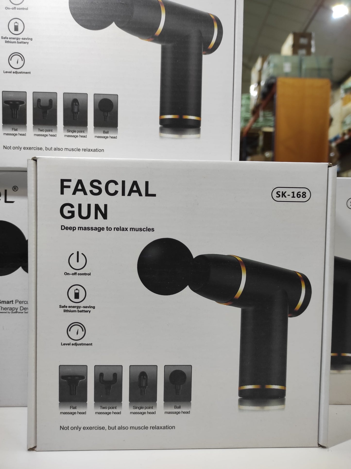 Pistola de masaje